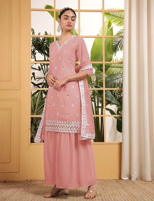 Salwar kameez pêche en georgette avec broderie à sequins