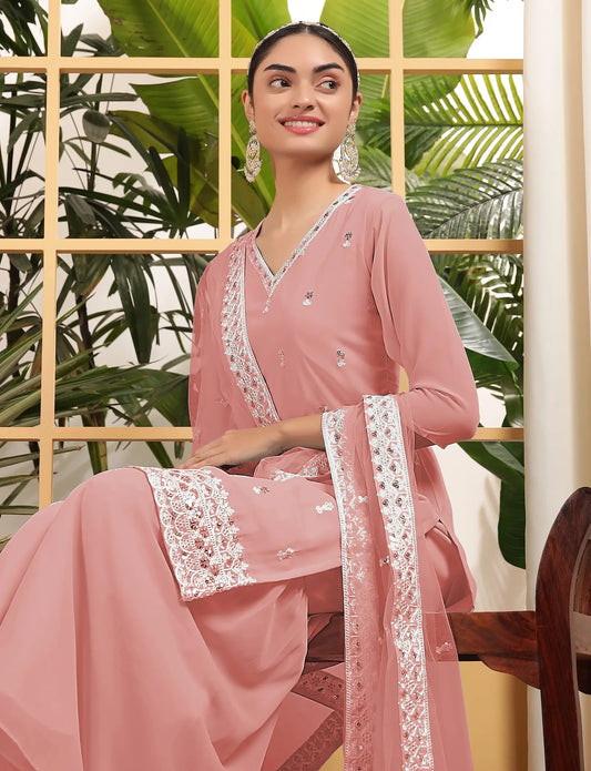 Salwar kameez pêche en georgette avec broderie à sequins