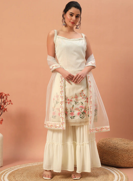 Ensemble salwar en georgette beige avec broderies à sequins – Élégance discrète et charme traditionnel pour femme