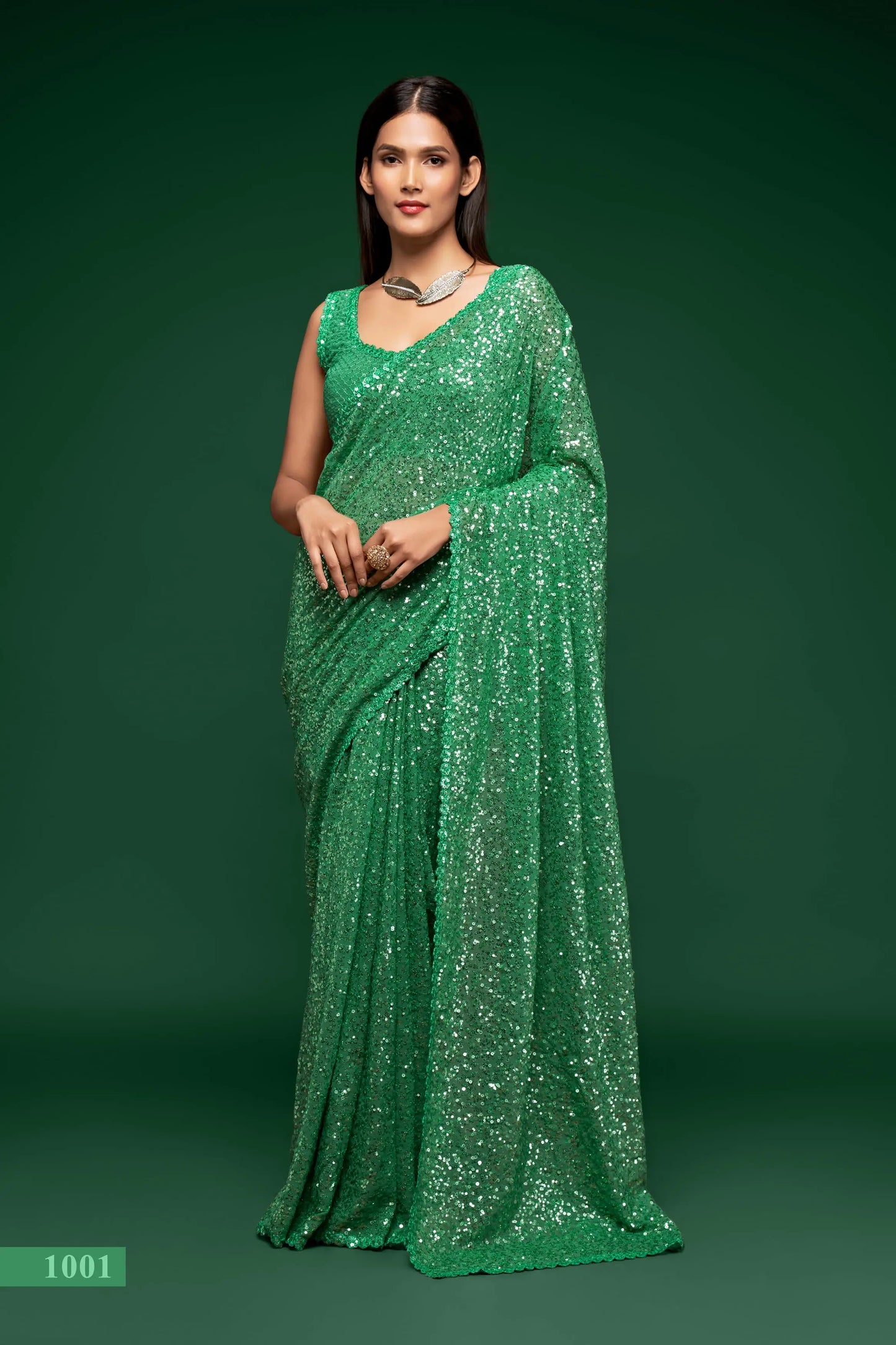 Mint green georgette sari with thread embroidery and multiple sequins NAYA COLLECTION