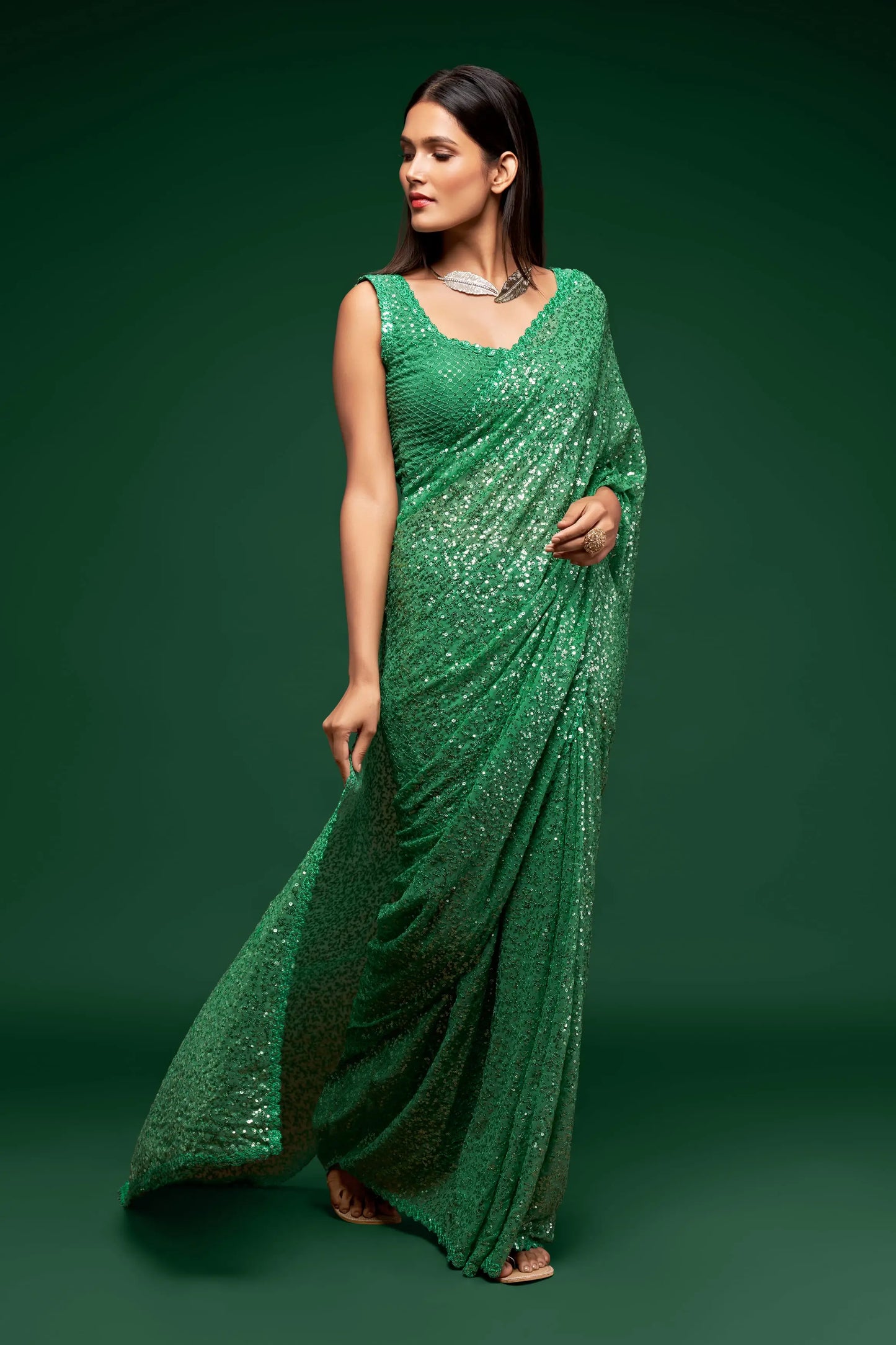 Mint green georgette sari with thread embroidery and multiple sequins NAYA COLLECTION
