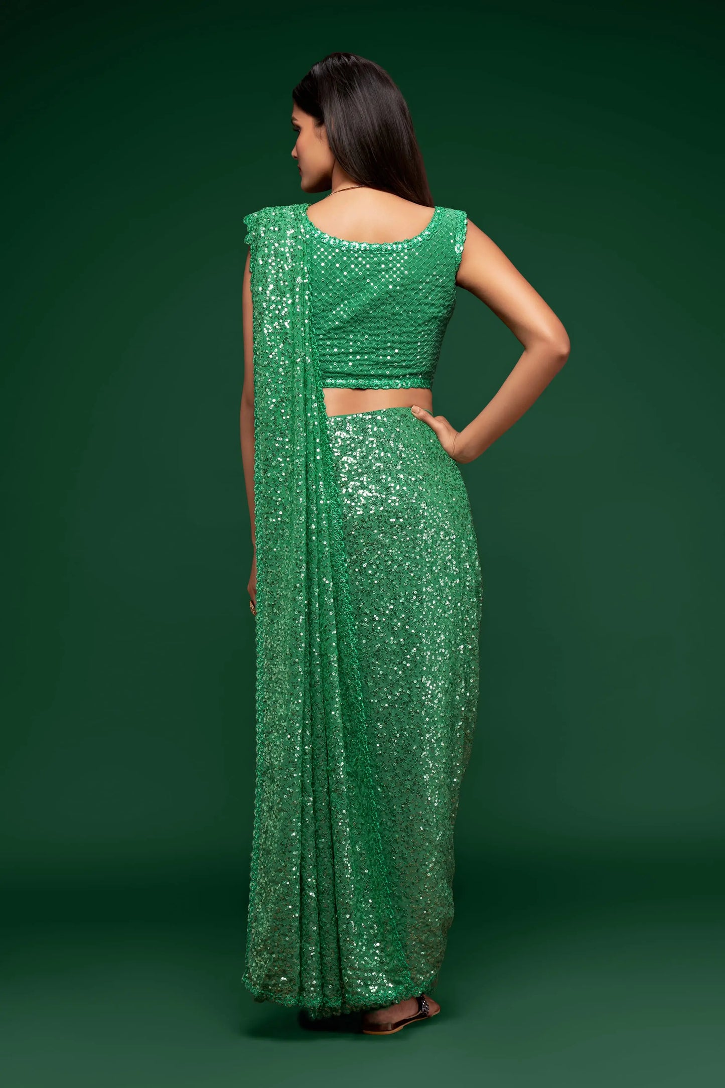 Mint green georgette sari with thread embroidery and multiple sequins NAYA COLLECTION