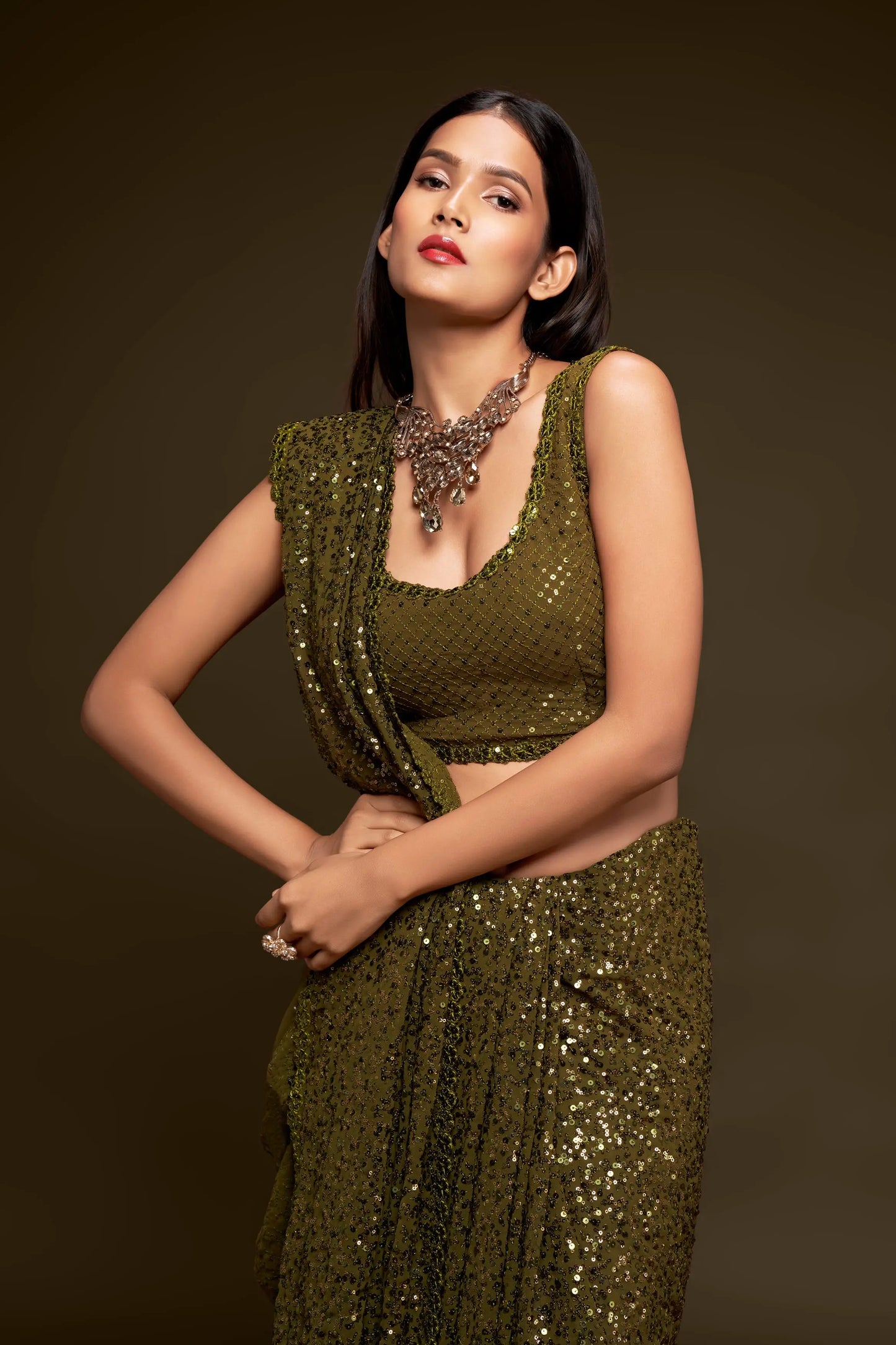 Olive green georgette sari with thread embroidery and multiple sequins NAYA COLLECTION