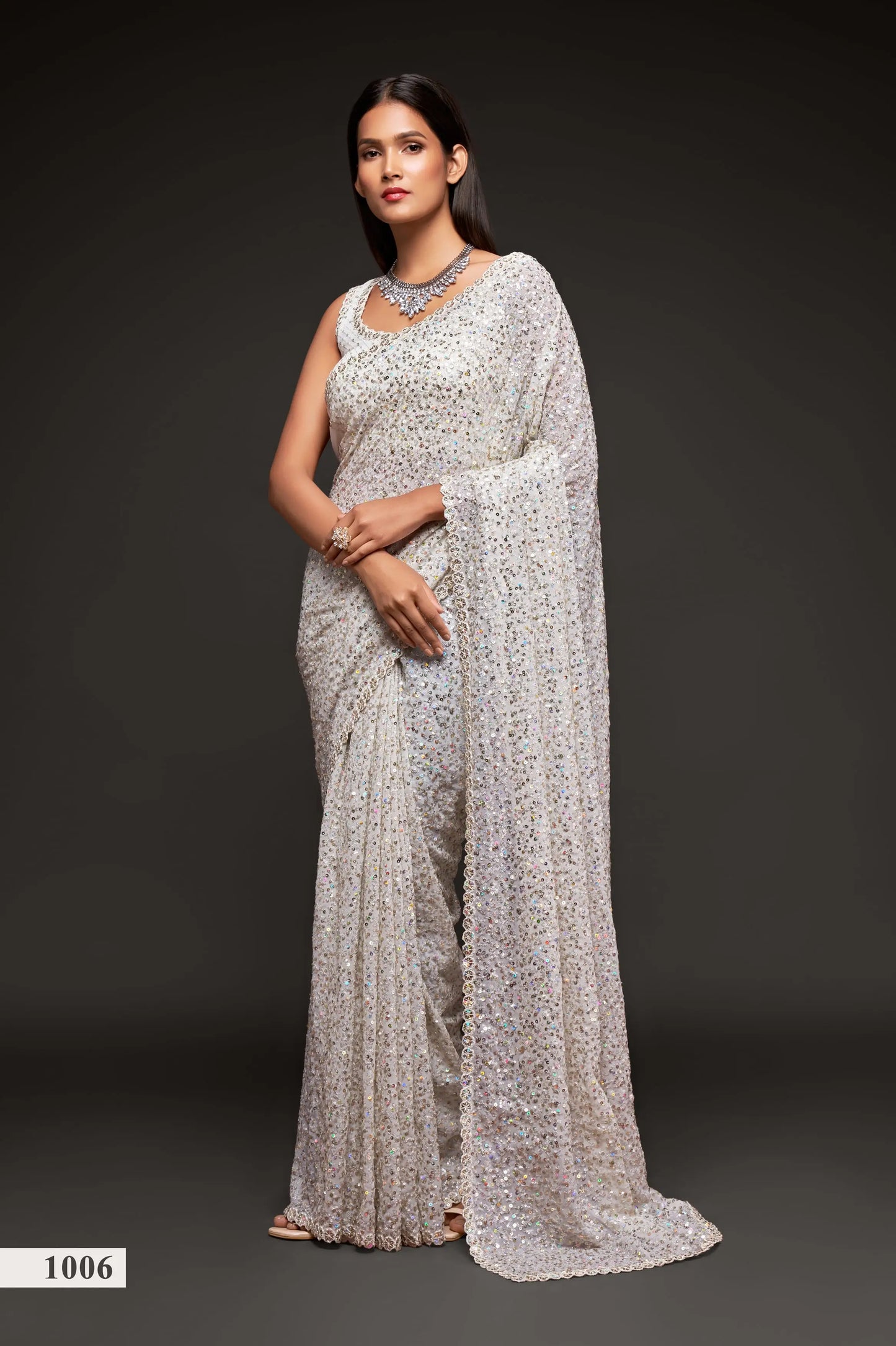 Pearly white georgette sari with thread embroidery and multiple sequins NAYA COLLECTION
