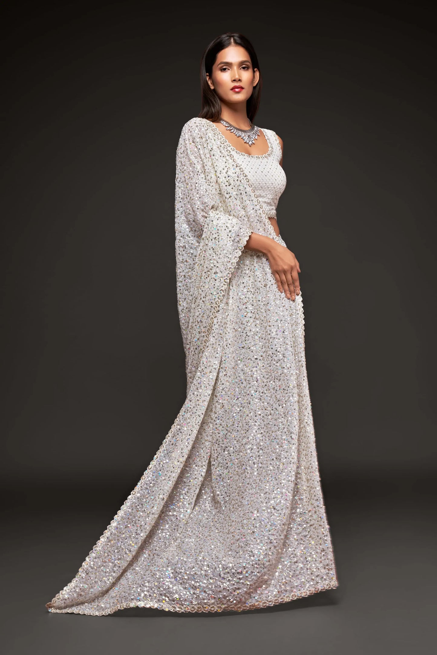 Pearly white georgette sari with thread embroidery and multiple sequins NAYA COLLECTION