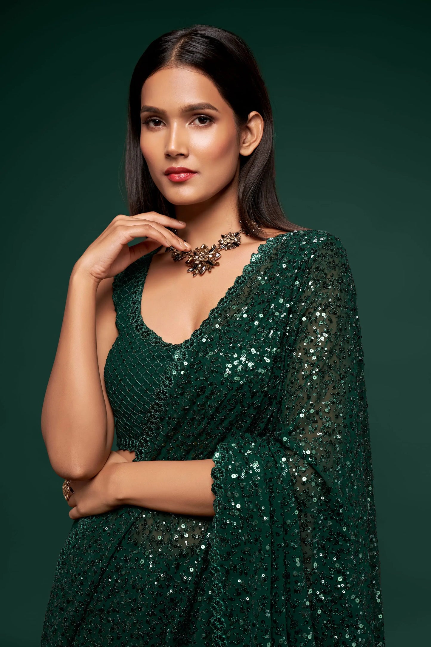 Dark green georgette sari with thread embroidery and multiple sequins NAYA COLLECTION