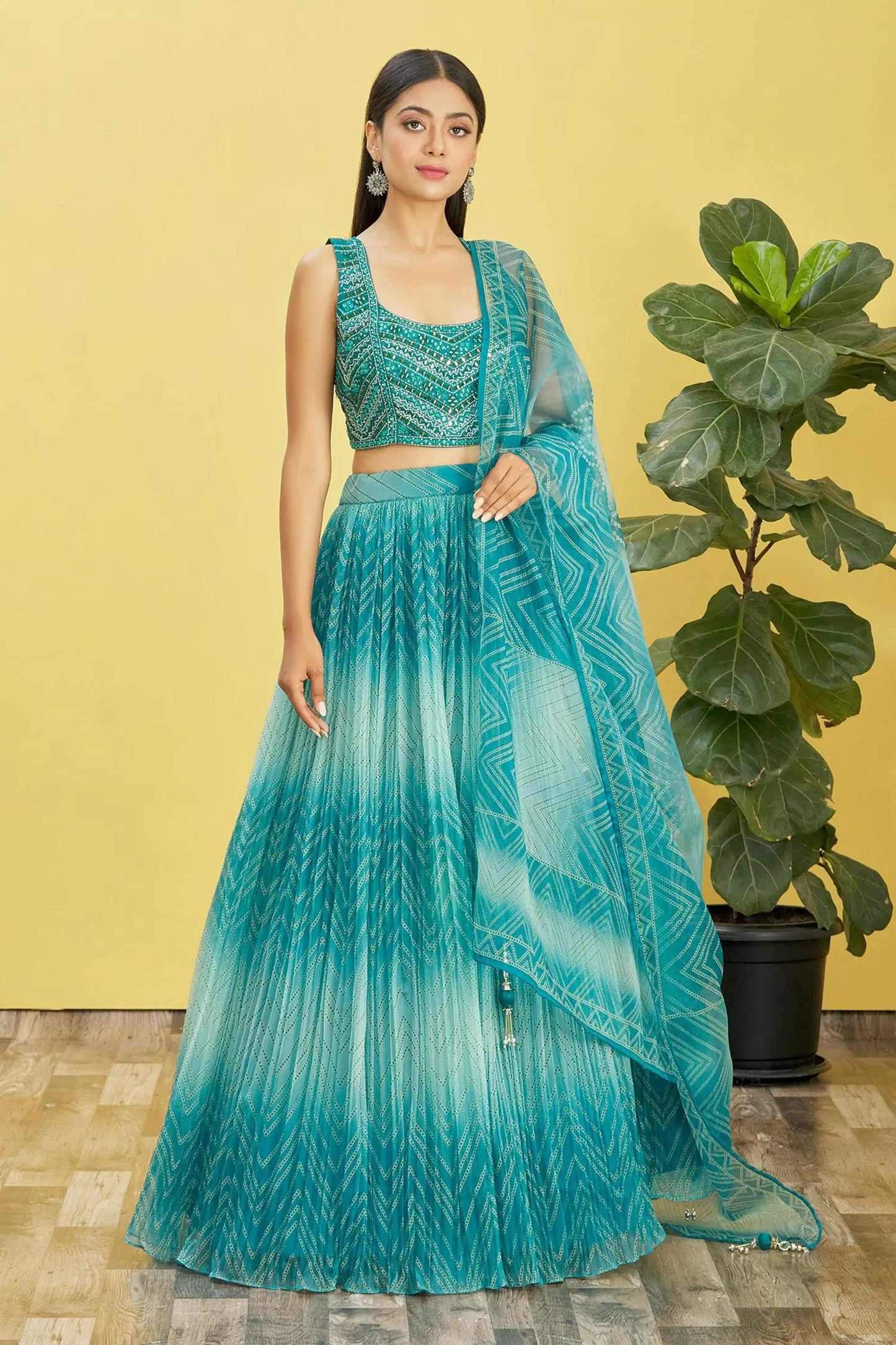 Ocean blue lehenga with digital print and sequin embroidery, adorned with real mirrors. RHEA COLLECTION.