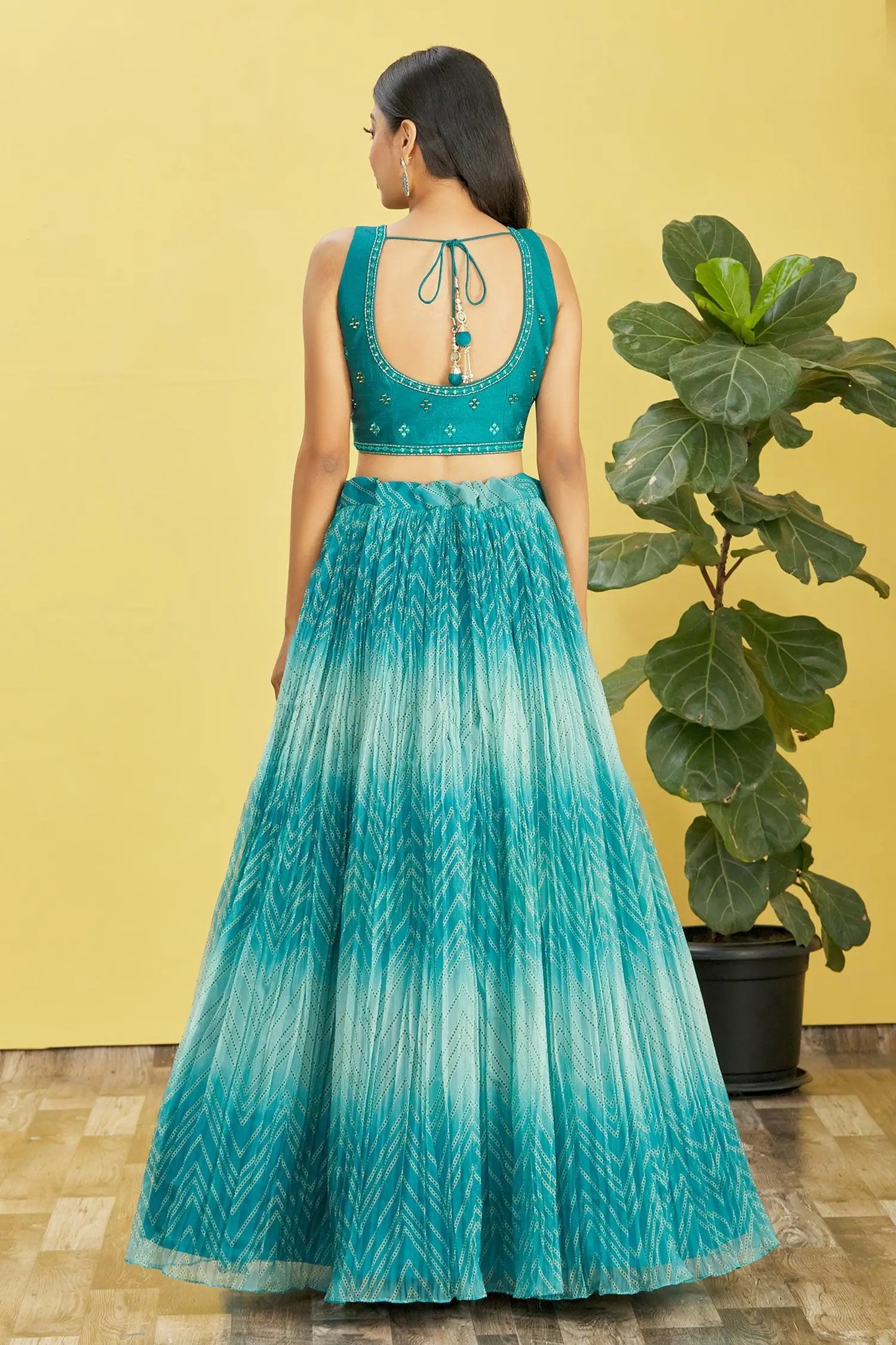 Ocean blue lehenga with digital print and sequin embroidery, adorned with real mirrors. RHEA COLLECTION.
