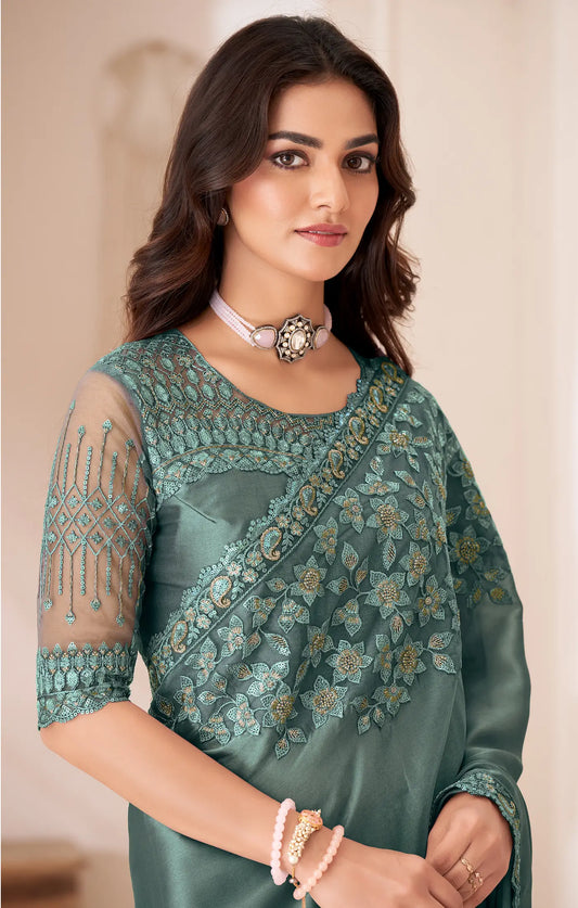 Pale green silk satin evening sari with sequin and thread embroidery