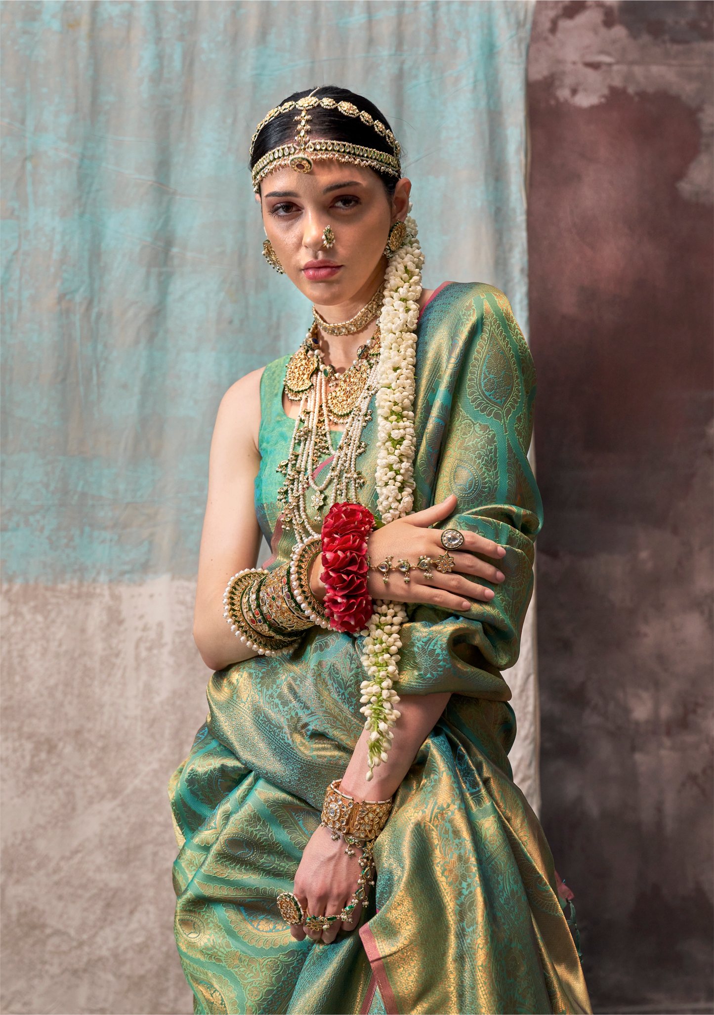 Green glass silk sari with multi-colored red floral blouse and digital print, sequin and thread embroidery