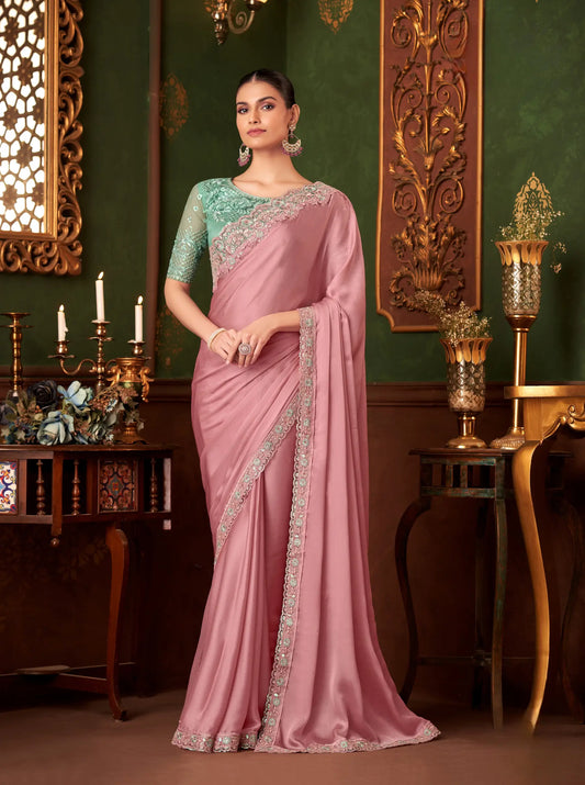 Powder pink chiffon silk party sari with thread embroidery and sequins