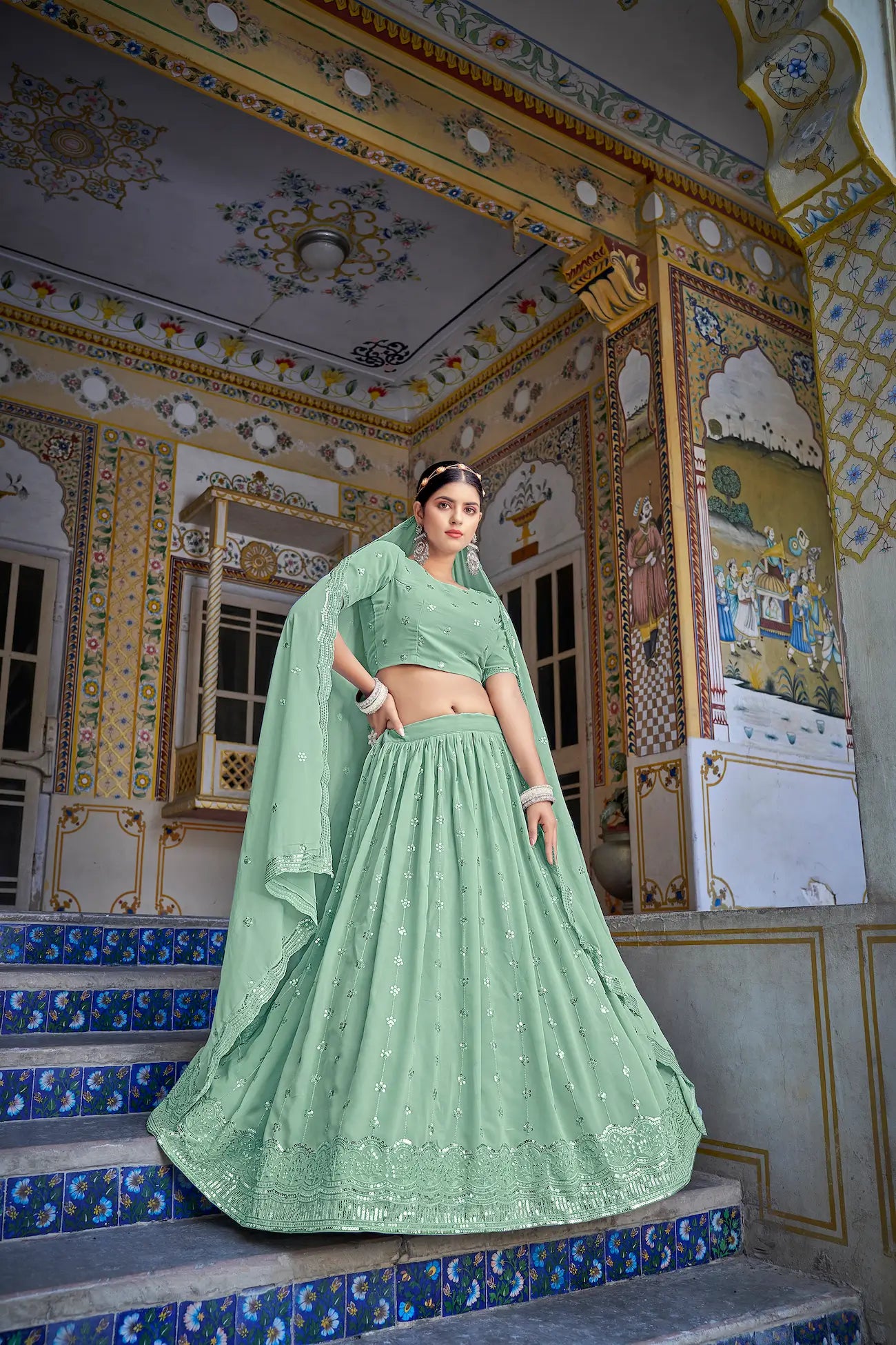 Lehenga choli vert pistache en georgette avec broderies de fils et sequins