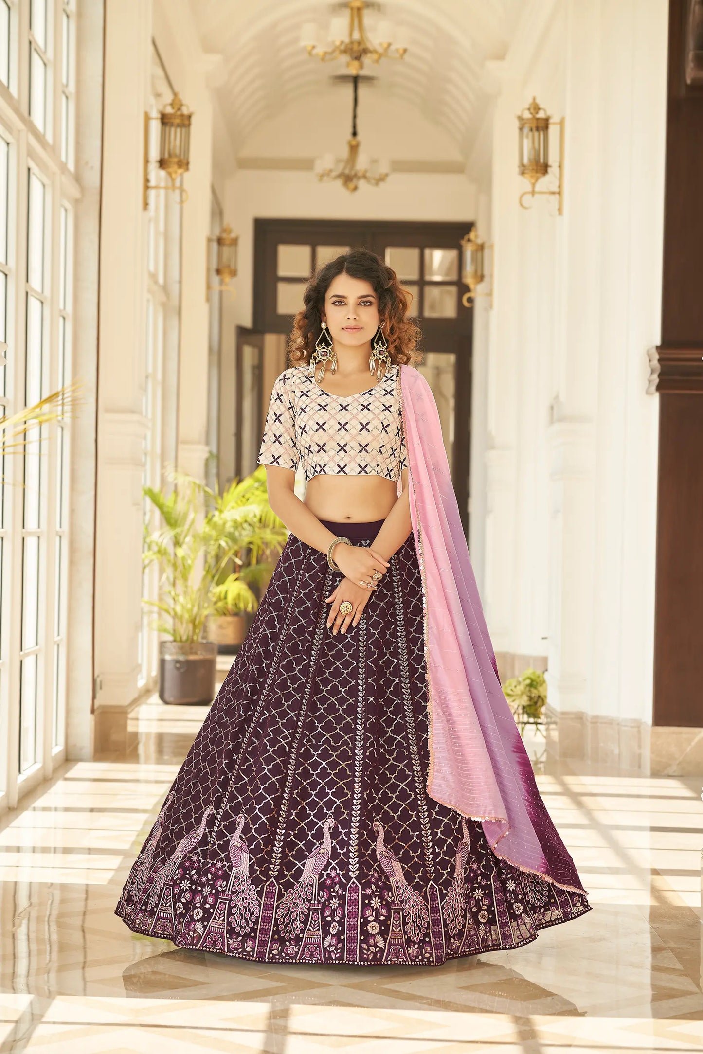 Dark purple lehenga with thread embroidery and sequin work, accompanied by a printed dupatta