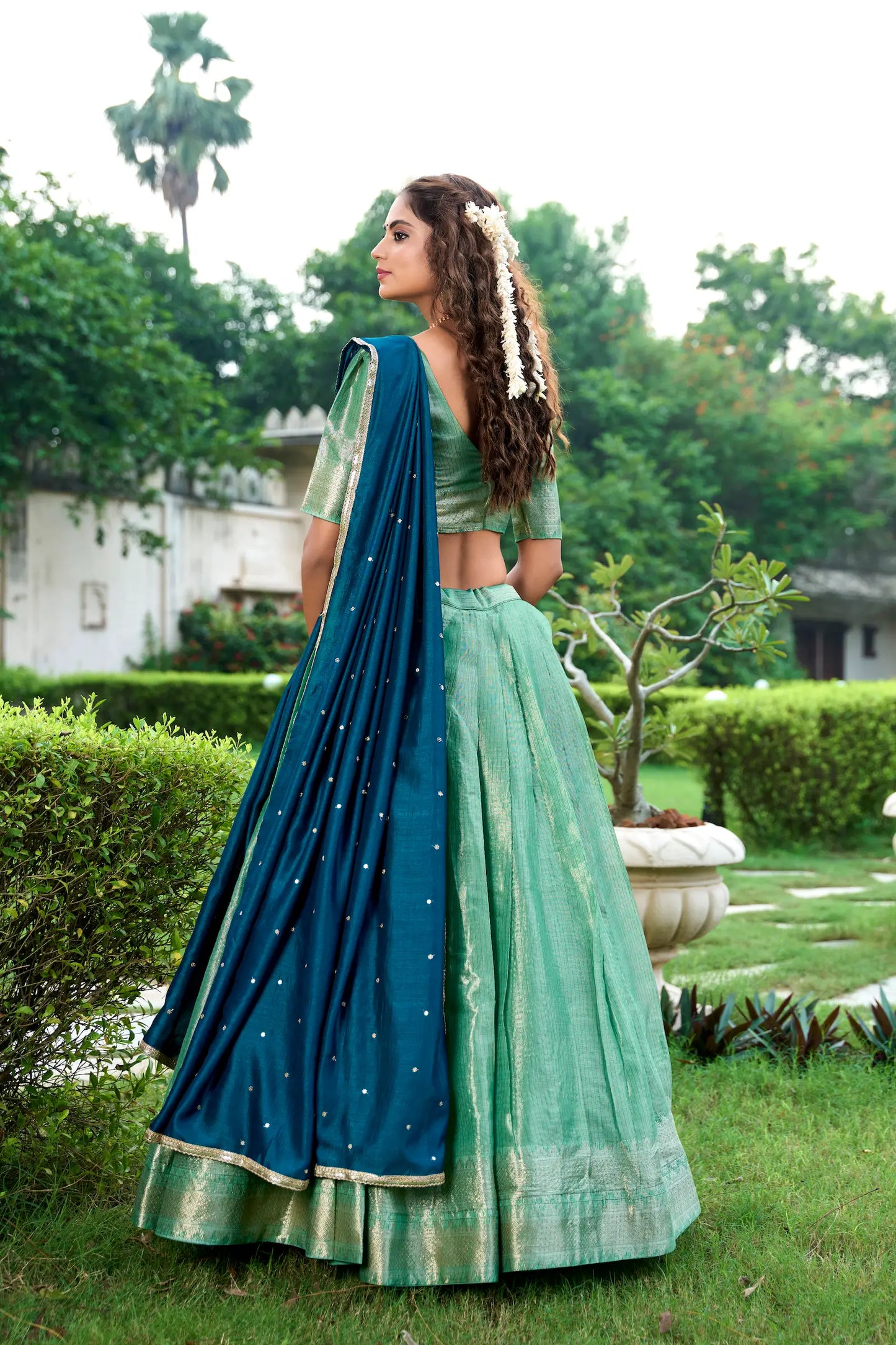 Seegrüner Lehenga Choli in Kanchipuram mit Zari-Webarbeit
