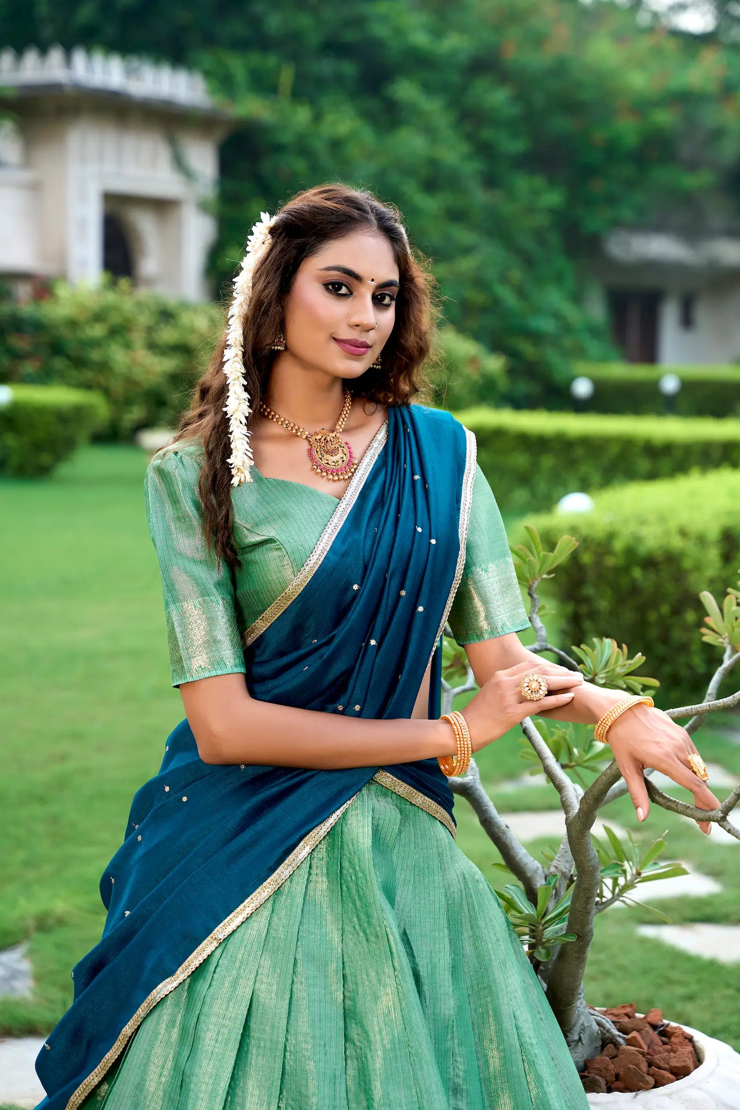Seegrüner Lehenga Choli in Kanchipuram mit Zari-Webarbeit