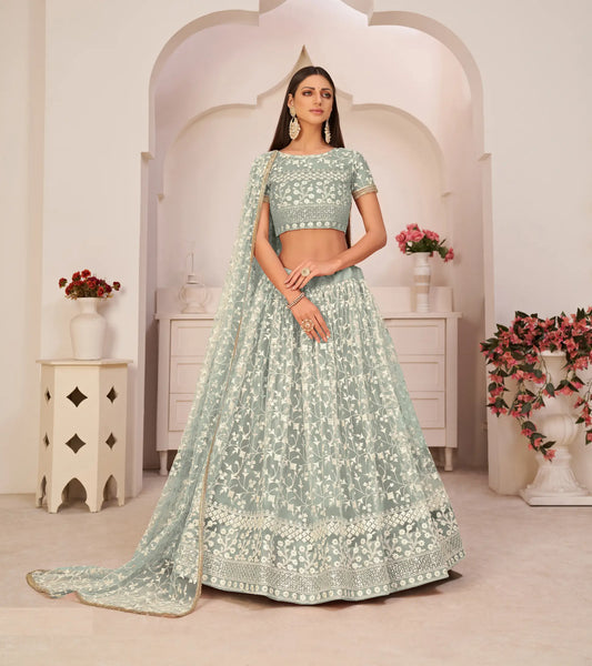 Lehenga Choli turquoise vert en filet avec broderie en fil de coton blanc, travail de zari et sequins
