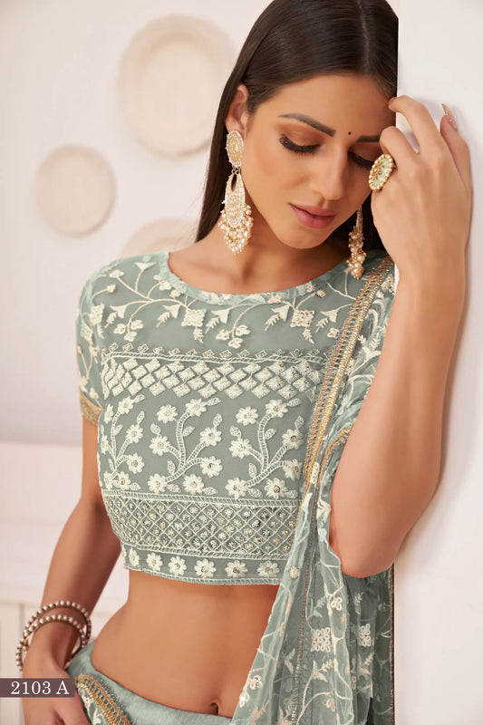 Lehenga Choli turquoise vert en filet avec broderie en fil de coton blanc, travail de zari et sequins