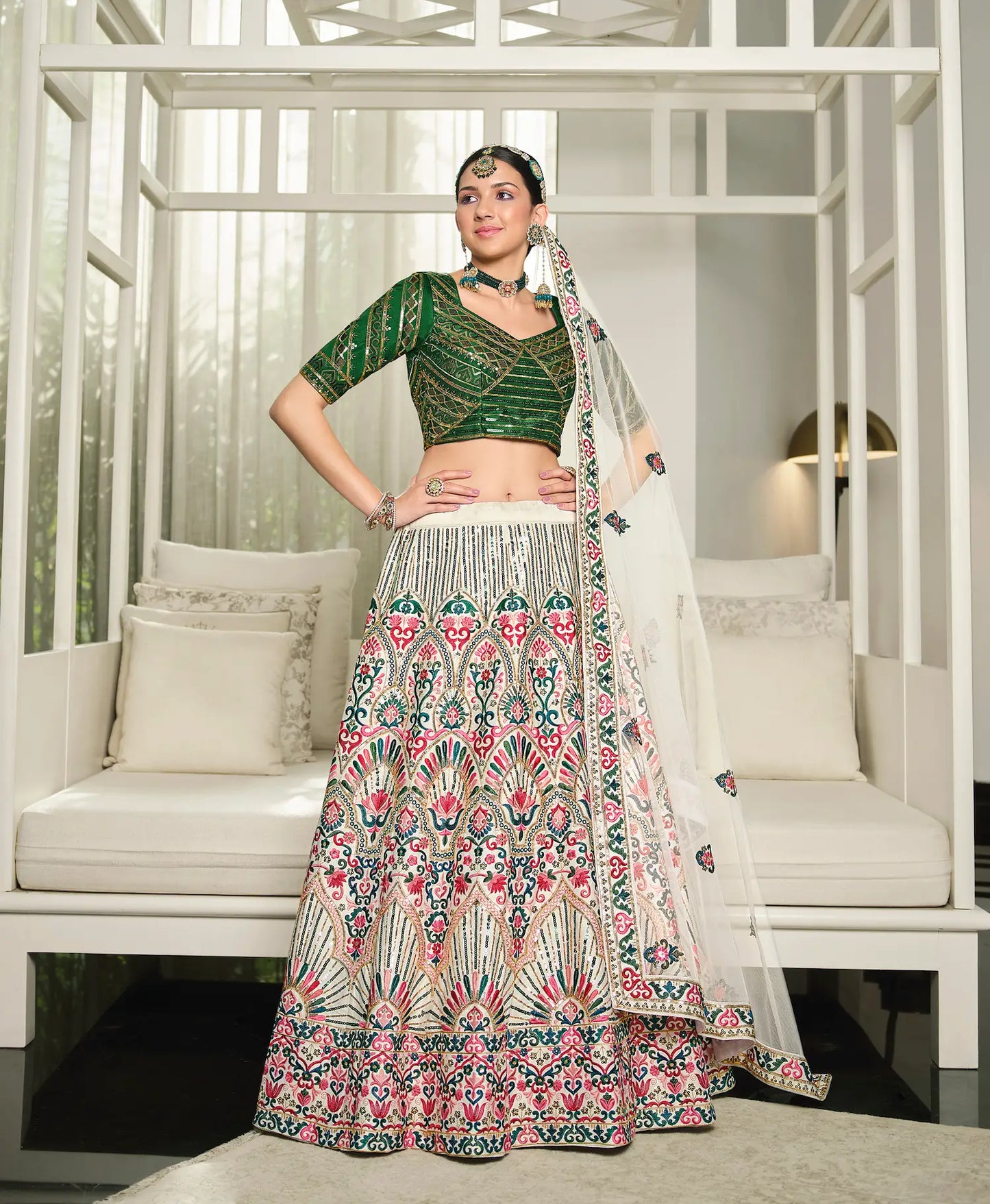 White and green silk lehenga choli with thread embroidery and sequins