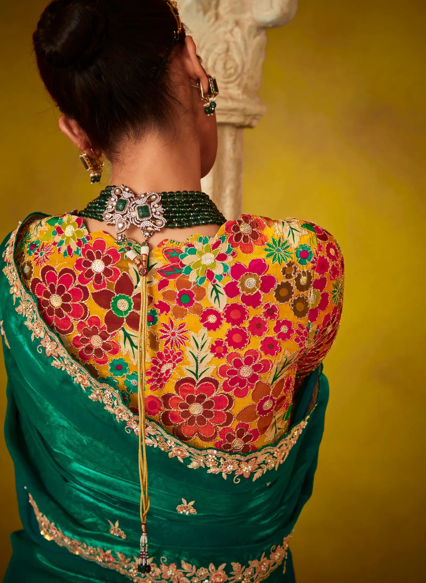 Green glass silk sari with multi-colored red floral blouse and digital print, sequin and thread embroidery