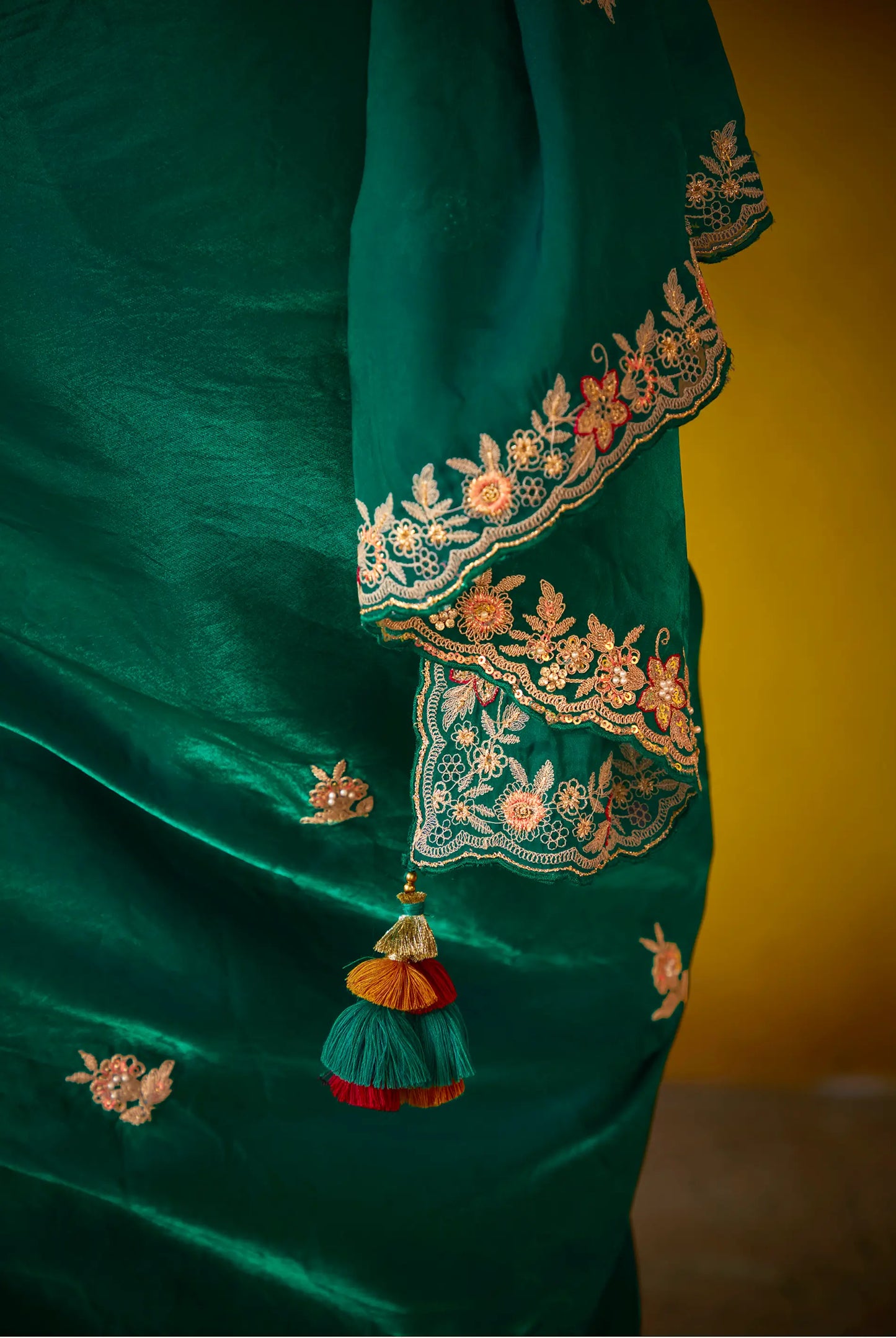 Green glass silk sari with multi-colored red floral blouse and digital print, sequin and thread embroidery