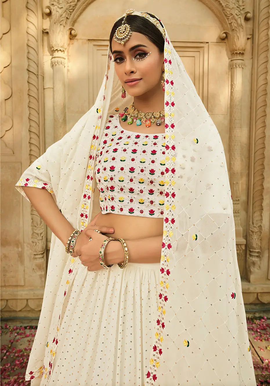 Off-white georgette lehenga choli with thread embroidery and sequins