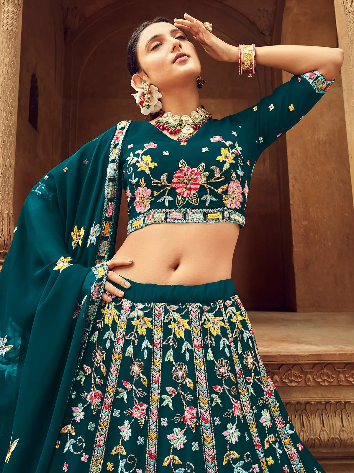 Rich teal blue georgette lehenga choli with thread embroidery and sequins