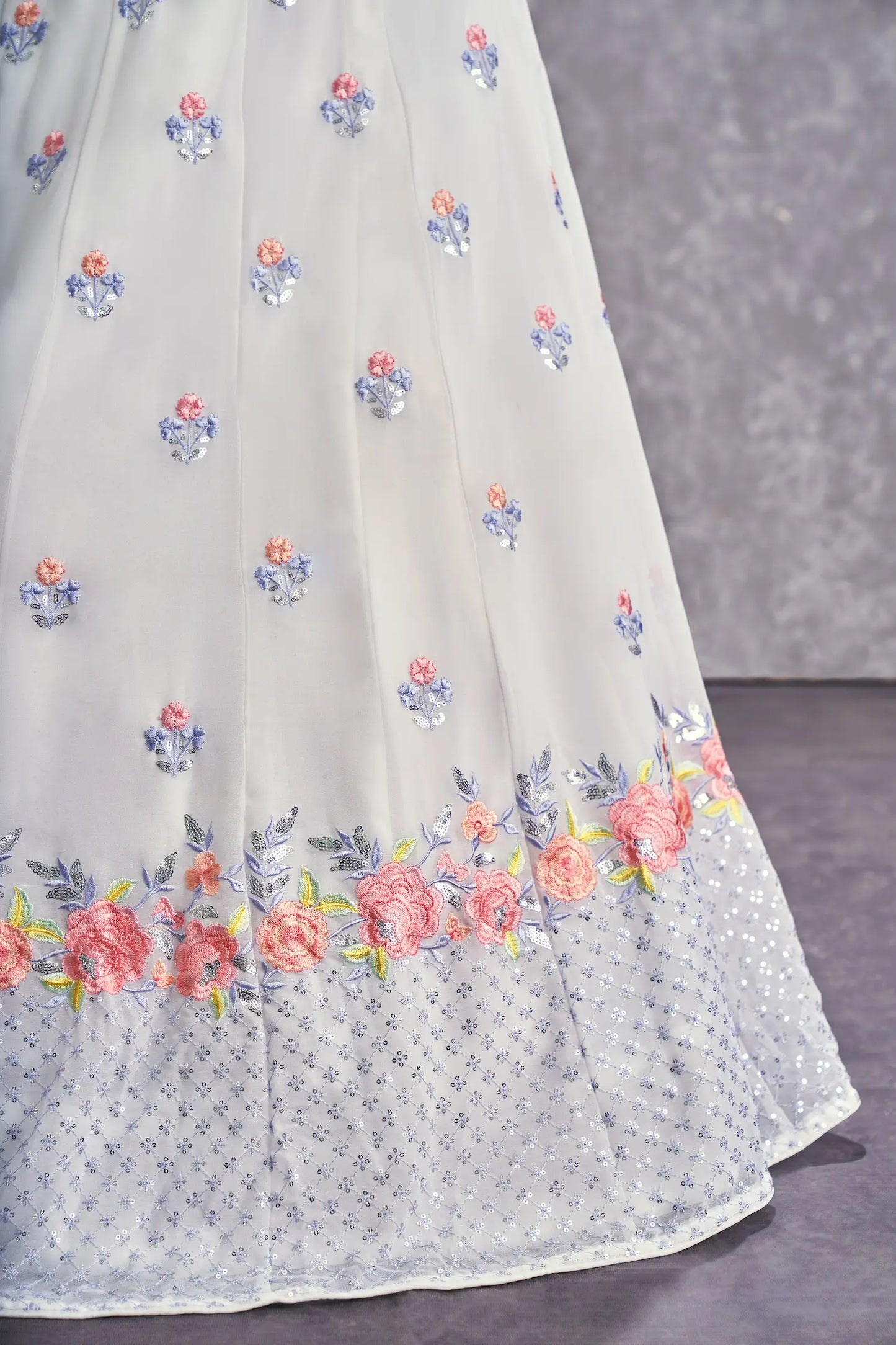 Snow white georgette lehenga choli with thread embroidery and sequins