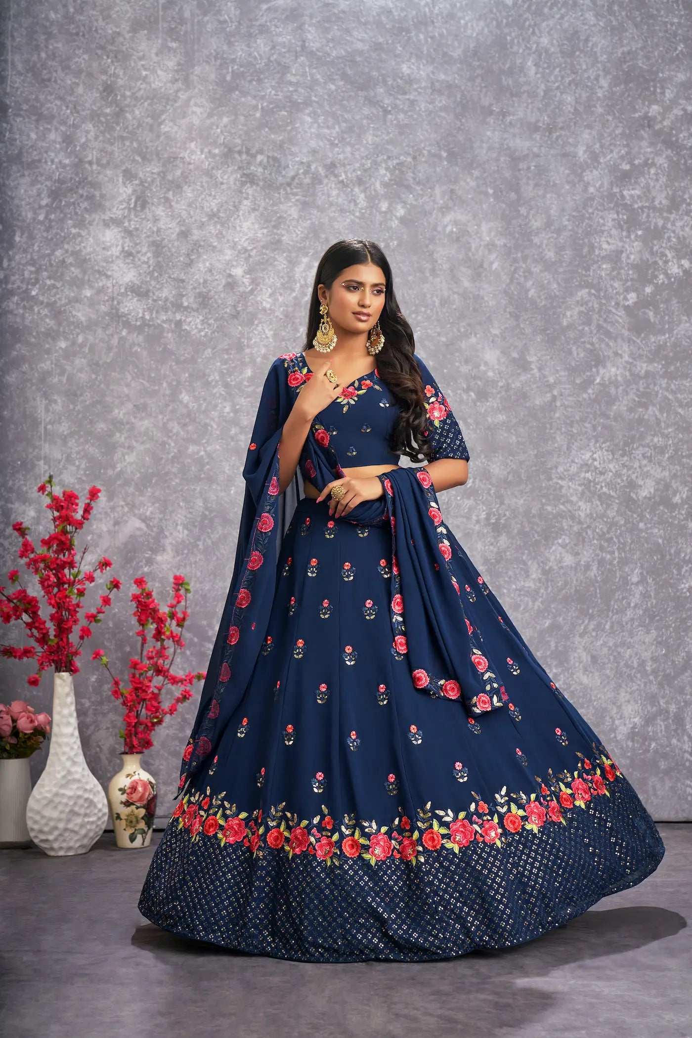 Teal blue georgette lehenga choli with thread embroidery and sequins