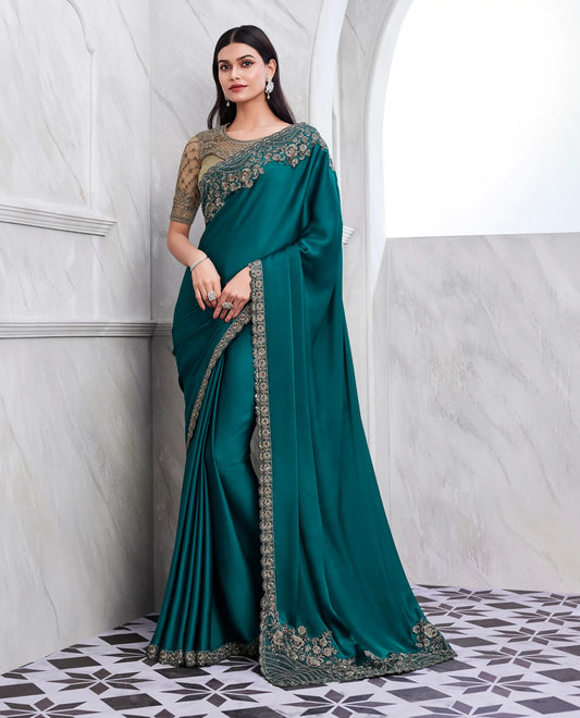 Sari en soie couleur bleu-vert riche avec blouse contrastante bronze brodée
