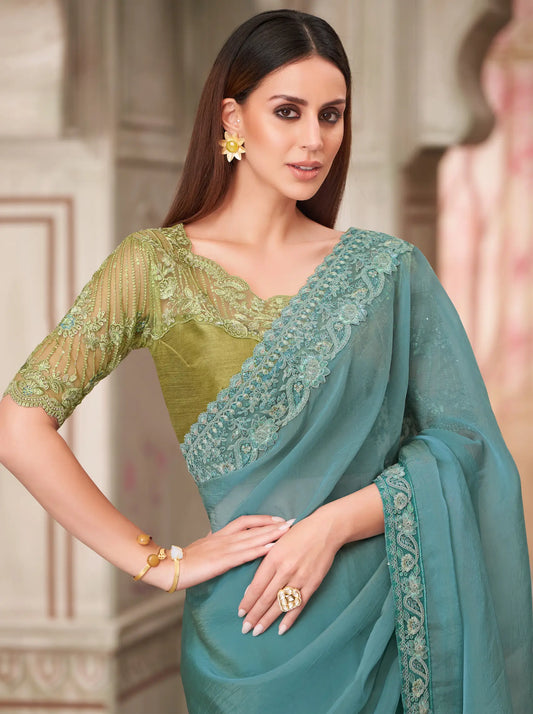Sky blue silk georgette party sari with thread embroidery and sequins