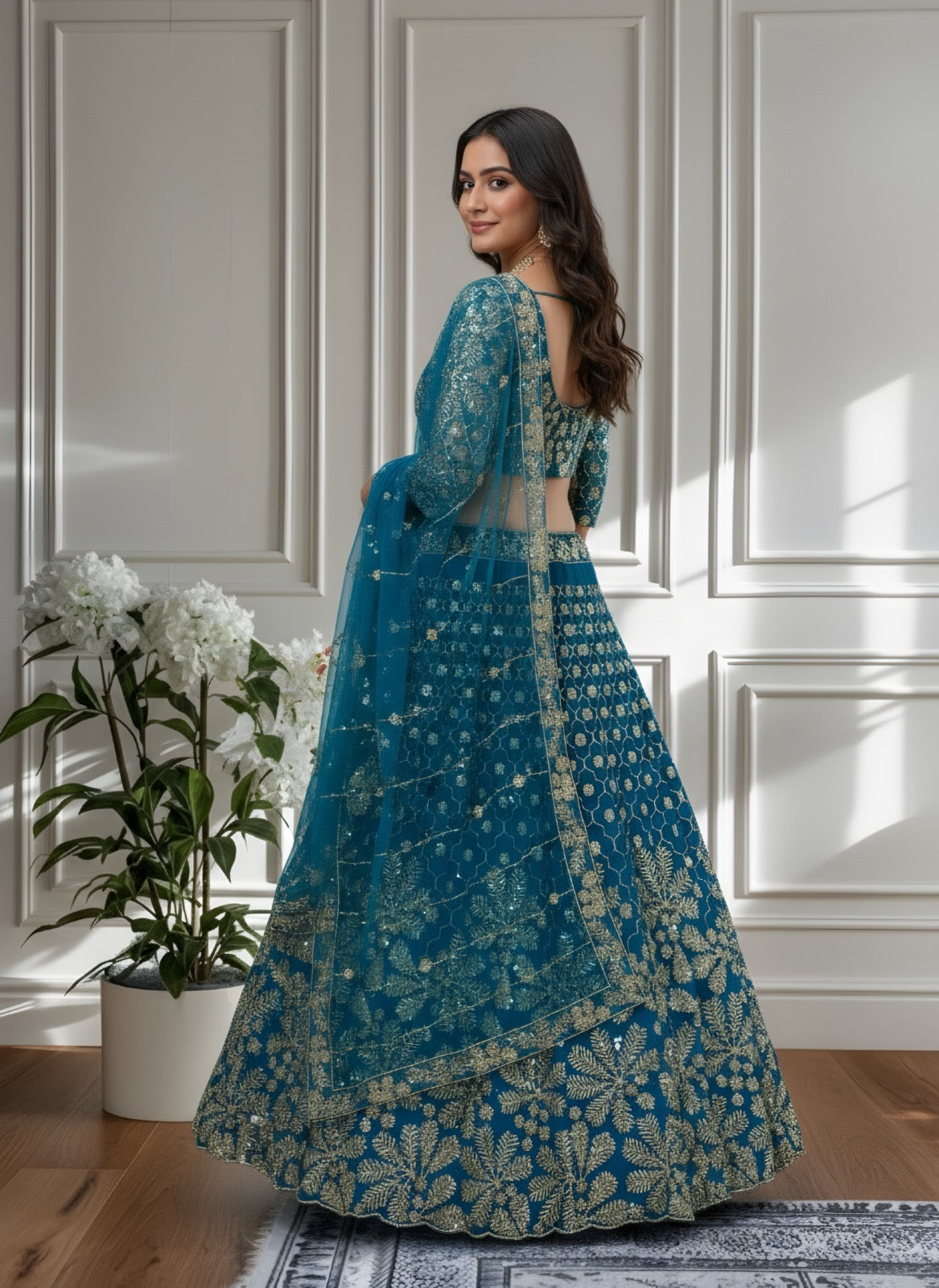 Lehenga bleu de soirée somptueux en butterfly net avec broderies de sequins