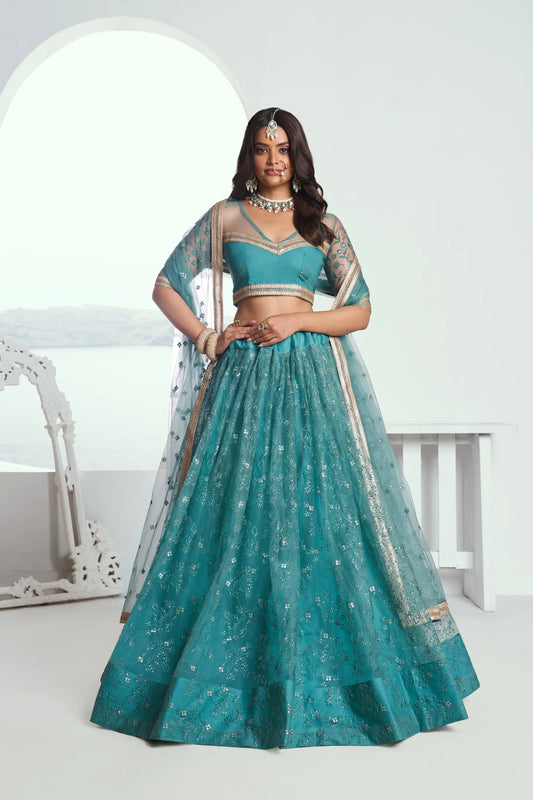 Lehenga Choli bleu turquoise en résille avec broderie au fil de coton et sequins COLLECTION CHANDRALEKHA