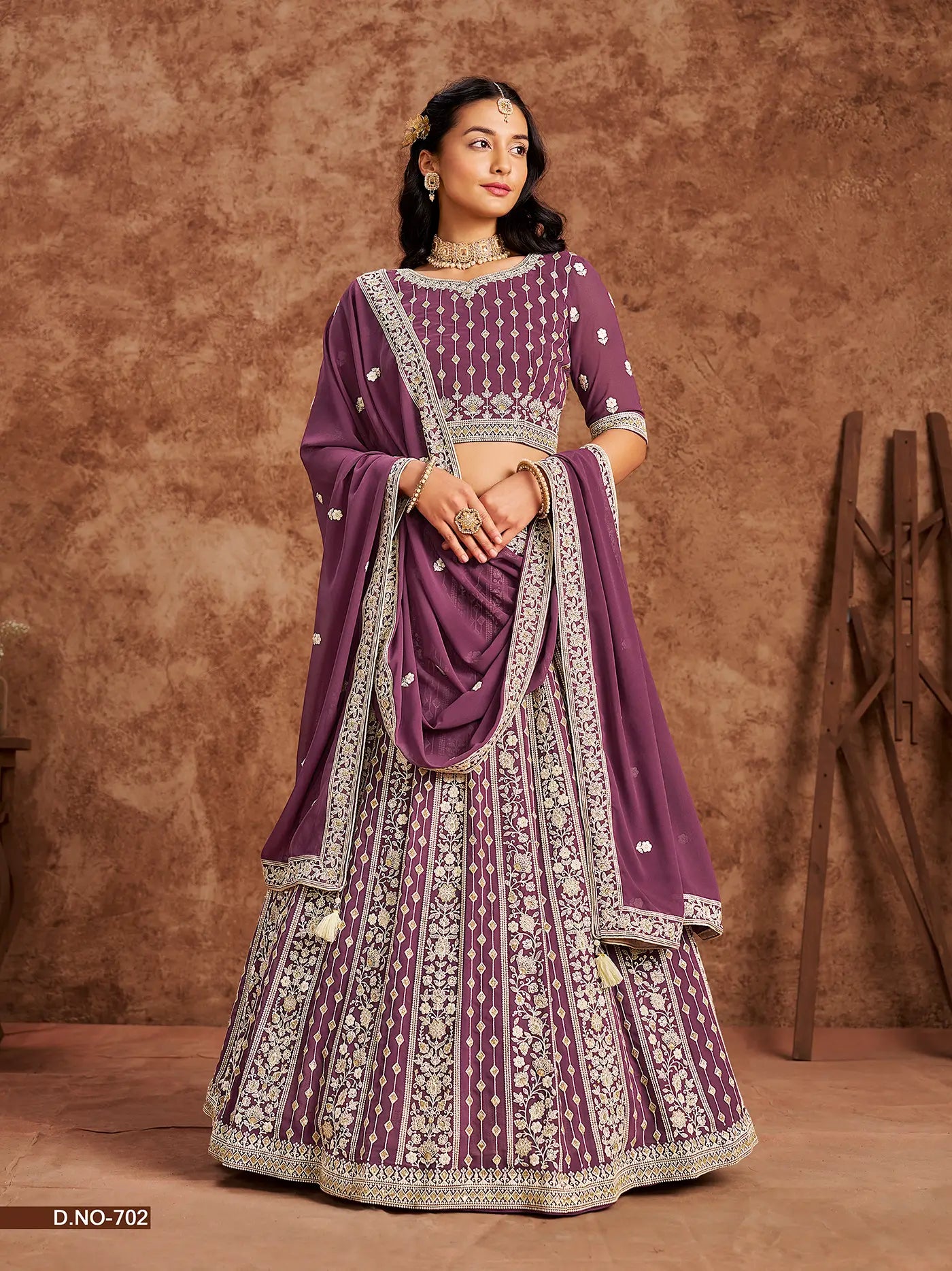 Designer Lehenga Choli aus dunkelmalvenfarbenem Kunstgeorgette mit Fadenstickerei und Pailletten