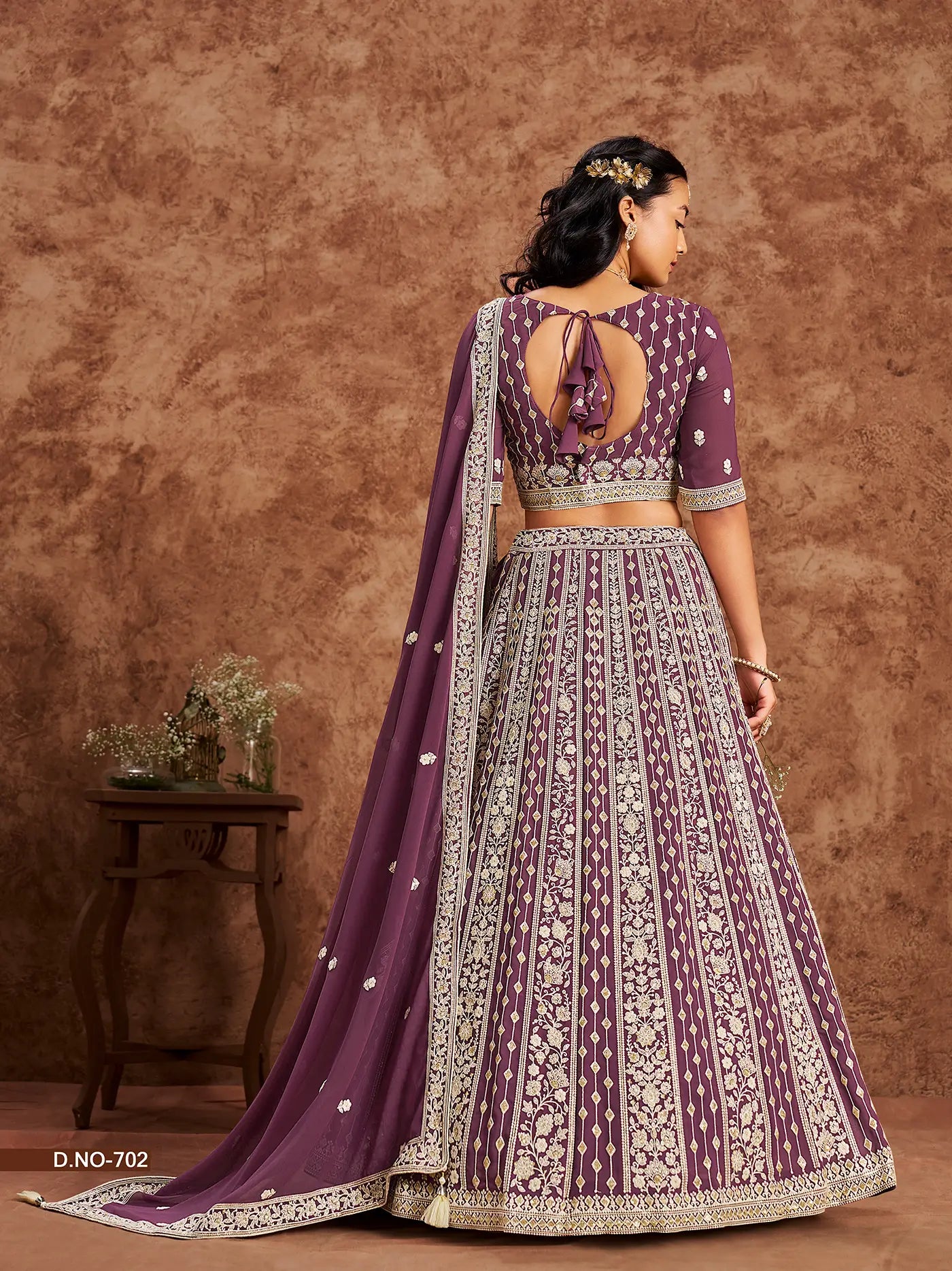 Designer Lehenga Choli aus dunkelmalvenfarbenem Kunstgeorgette mit Fadenstickerei und Pailletten