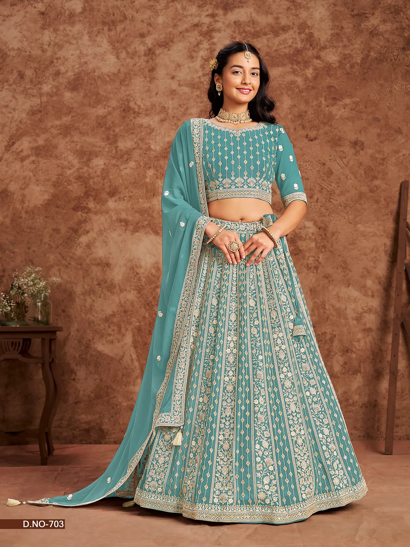 Designer Lehenga Choli aus hellblau-grünem Georgette-Imitat mit Faden- und Paillettenstickerei