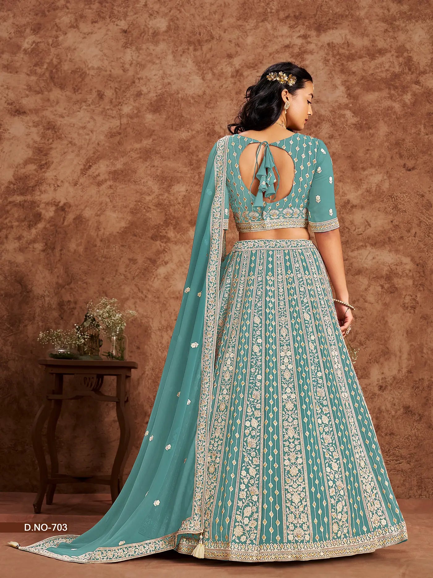 Designer Lehenga Choli aus hellblau-grünem Georgette-Imitat mit Faden- und Paillettenstickerei