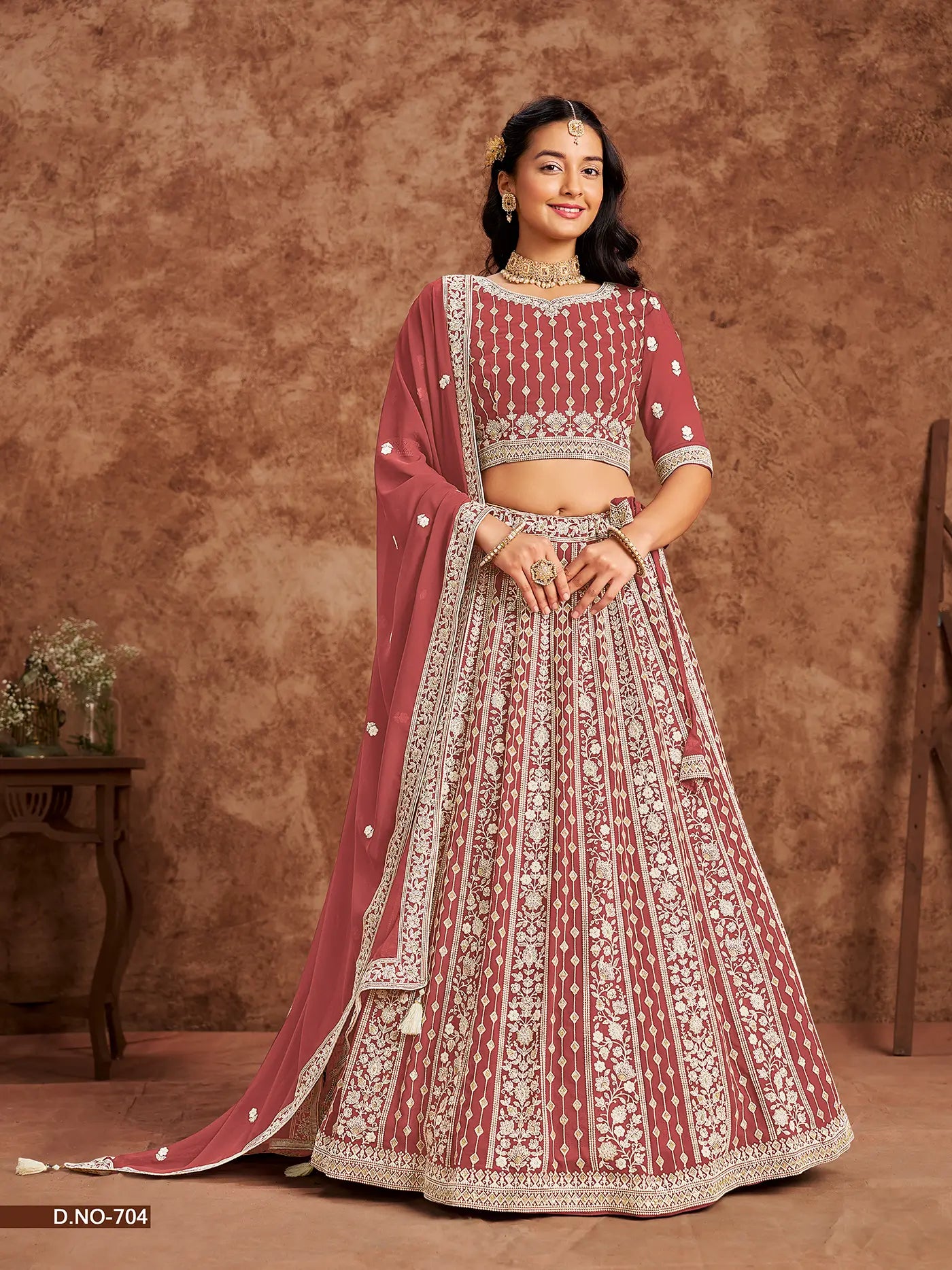 Designer Lehenga choli de créateur en faux georgette rouge pâle avec broderies de fils et sequins