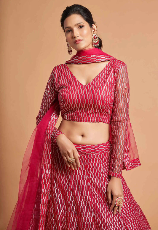 Lehenga choli en filet doux rose fuchsia avec broderie en fil et multiples sequins
