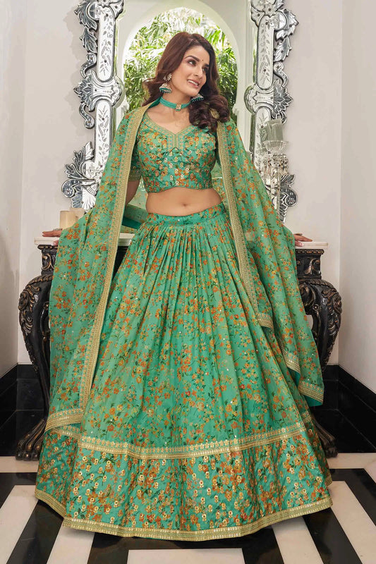 Lehenga en organza de couleur vert pistache avec imprimé floral et travail de broderie avec fil, zari, dori et sequins