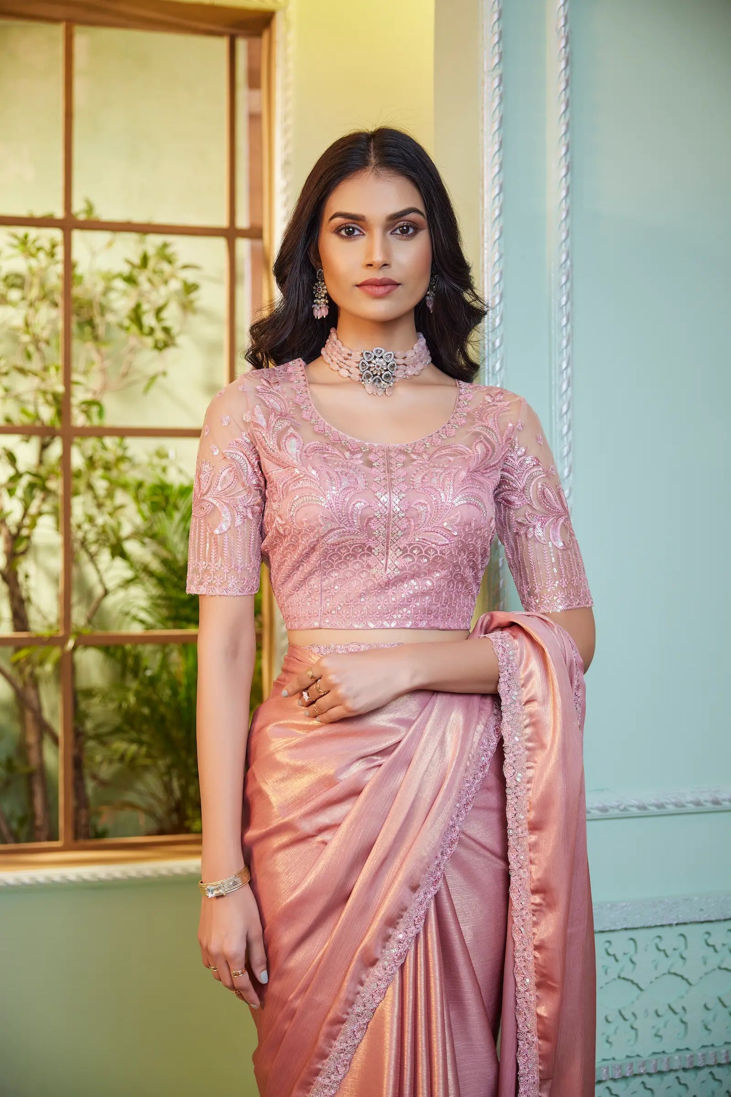 Pale pink glittery georgette party sari with sequin and thread embroidery