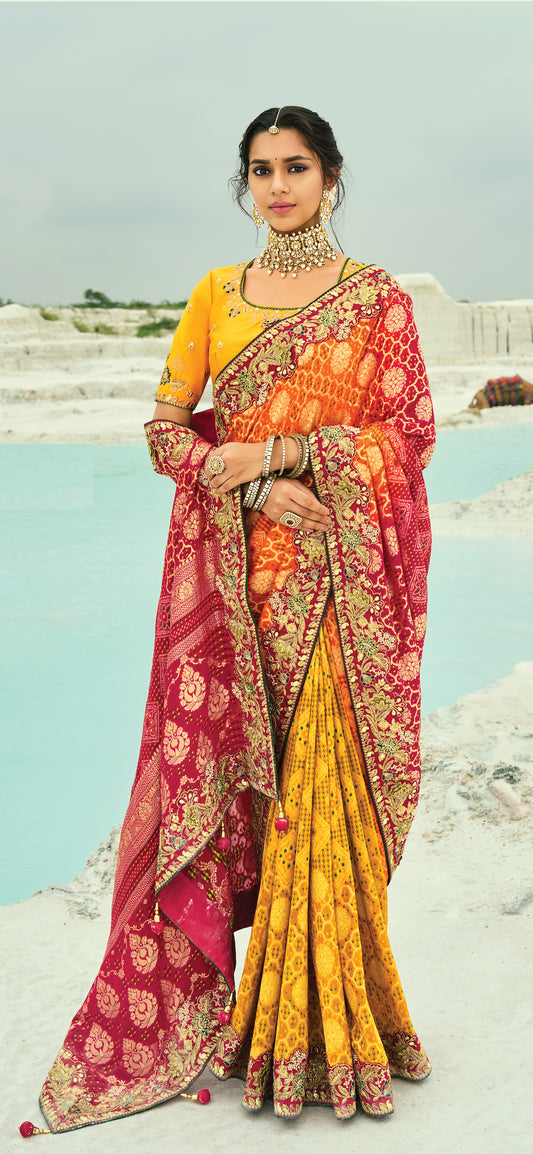 Sari jaune et orange en pur tissu georgette bandhej avec travail fait main de moti et cut-dana COLLECTION KHUSHI