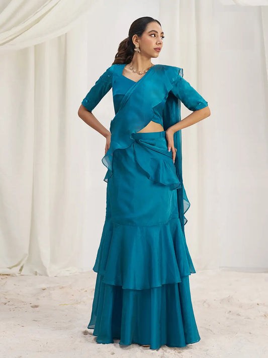 Sari de soirée en organza bleu-vert avec broderies artisanales