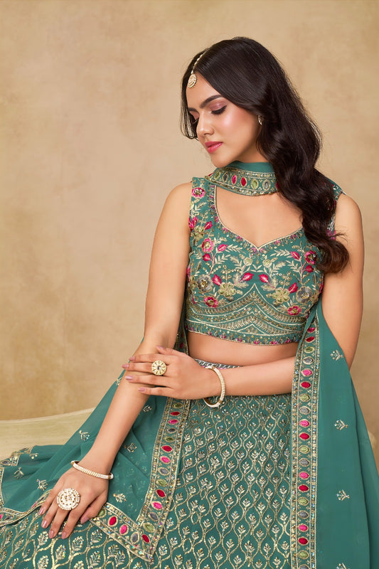 Lehenga bleu canard avec broderies romantiques de fleurs COLLECTION MONICA