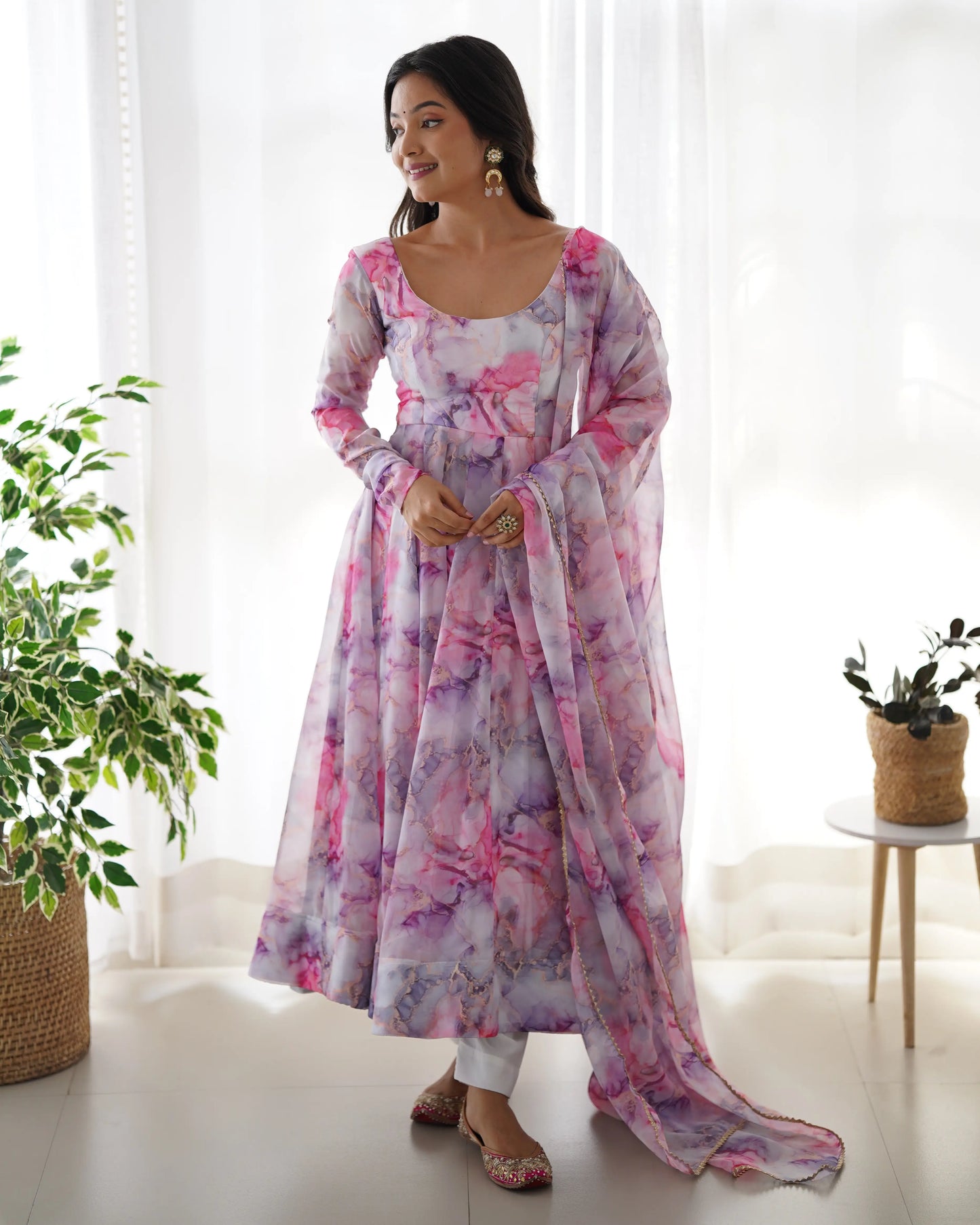 Anarkali dress in multi-colored printed organza on an ecru white background
