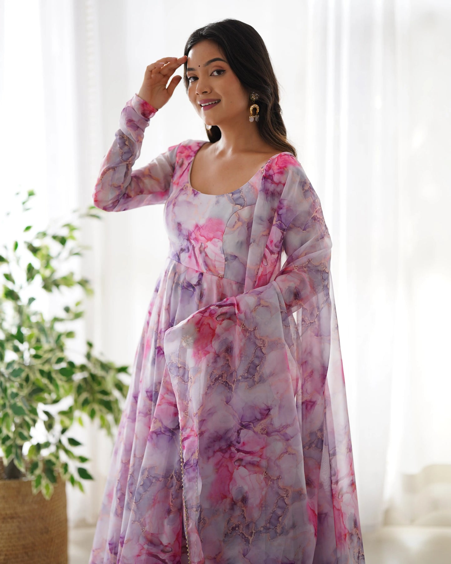 Anarkali dress in multi-colored printed organza on an ecru white background
