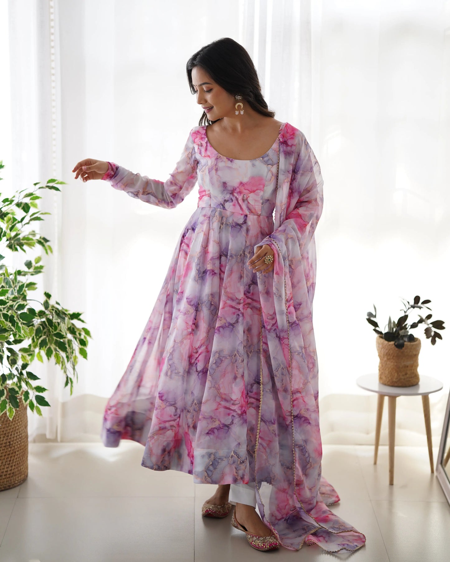 Anarkali dress in multi-colored printed organza on an ecru white background
