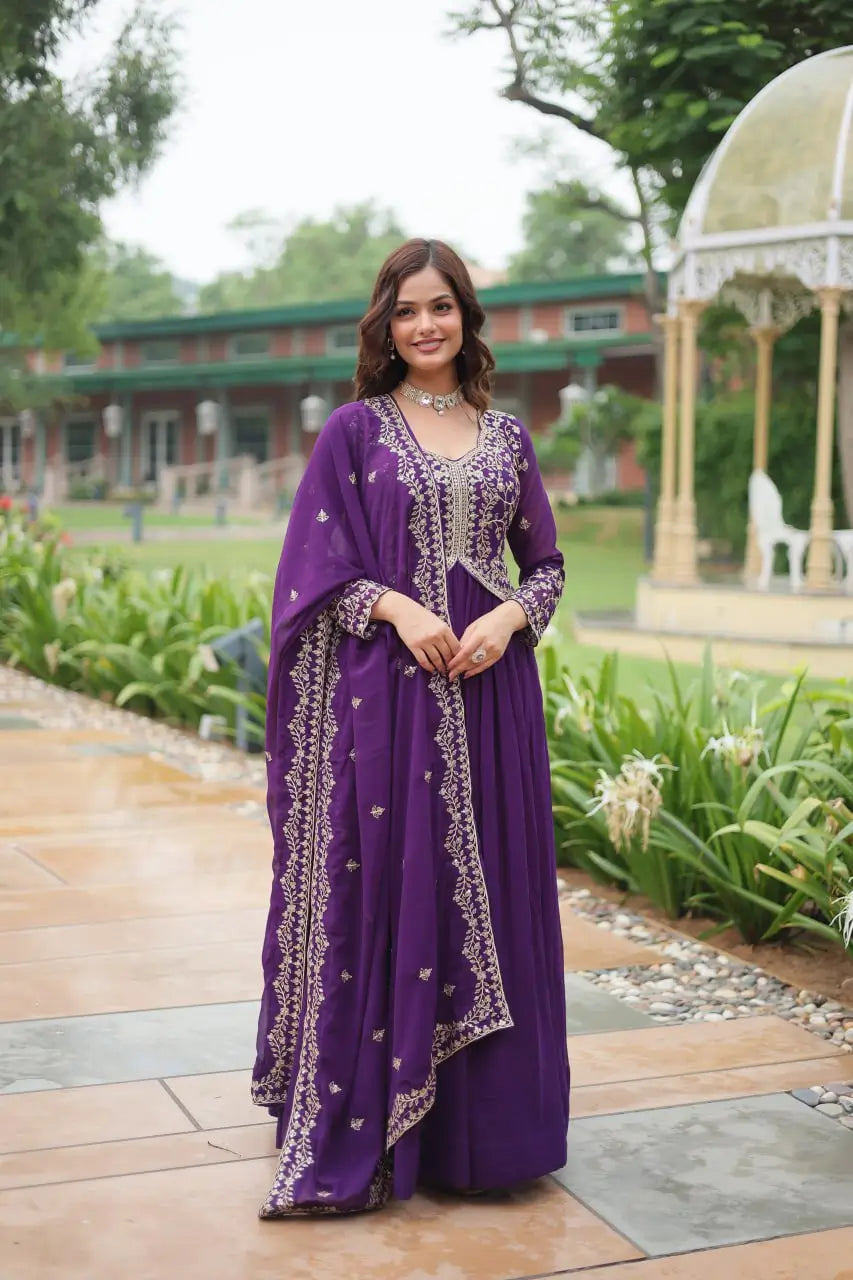 Dark purple georgette dress with zari embroidery and multiple sequins, accompanied by a dupatta