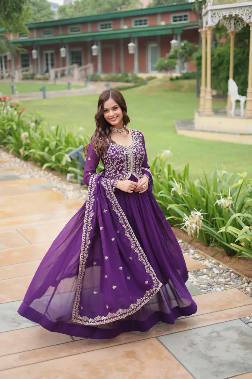 Dark purple georgette dress with zari embroidery and multiple sequins, accompanied by a dupatta