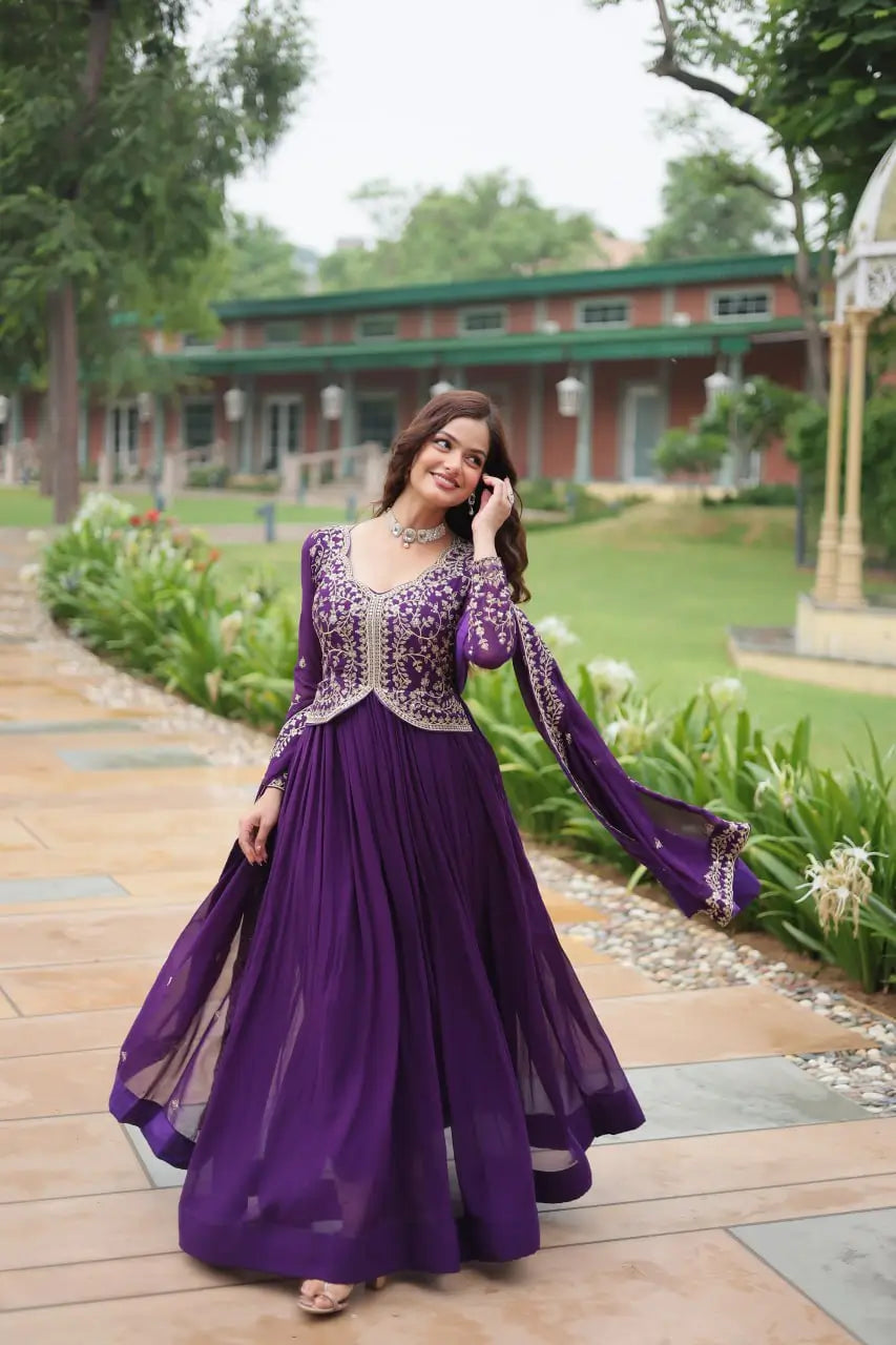 Dark purple georgette dress with zari embroidery and multiple sequins, accompanied by a dupatta