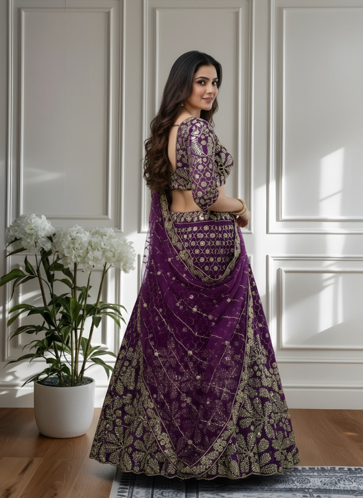 Lehenga violet foncé somptueux en butterfly net avec broderies de sequins
